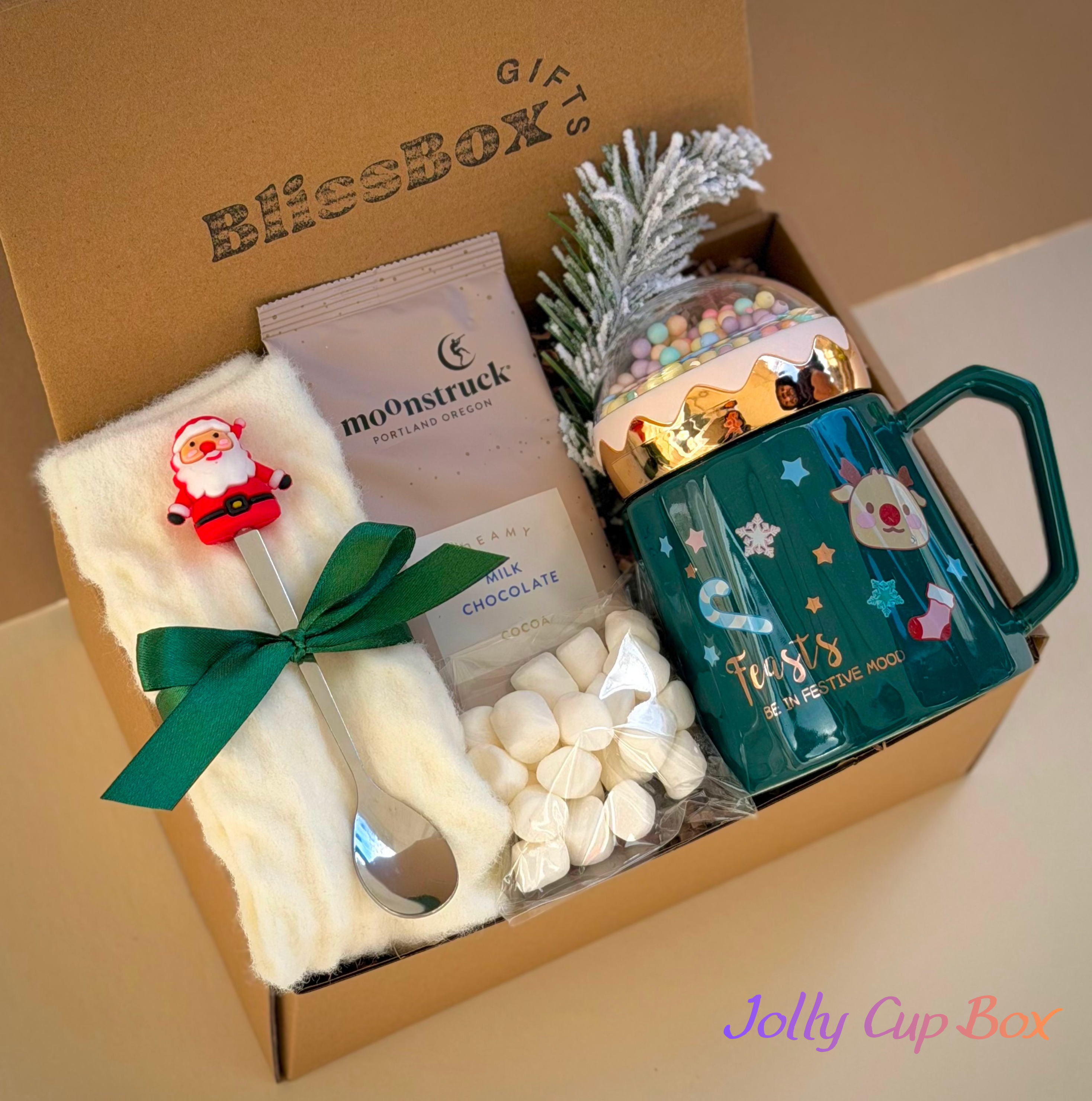 christmas mug gift set
holiday hot cocoa box
cozy winter gift for women
christmas candle blanket set
festive mug gift basket
hot chocolate holiday gift