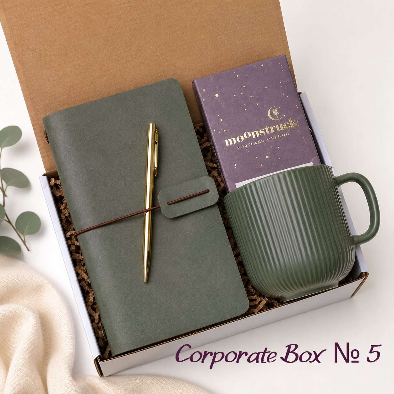 Corporate Gift Box No. 5 with olive journal, gold pen, green ribbed ceramic mug and Moonstruck chocolate bar